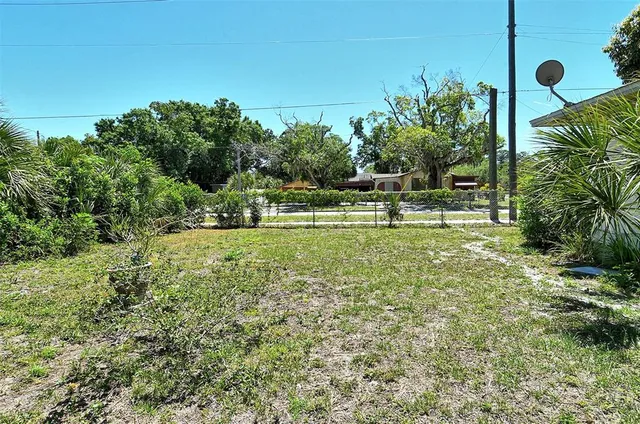 a view of garden with trees