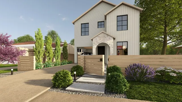 a front view of a house with a garden