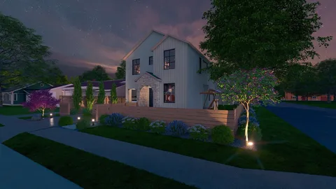 a front view of a house with yard and green space