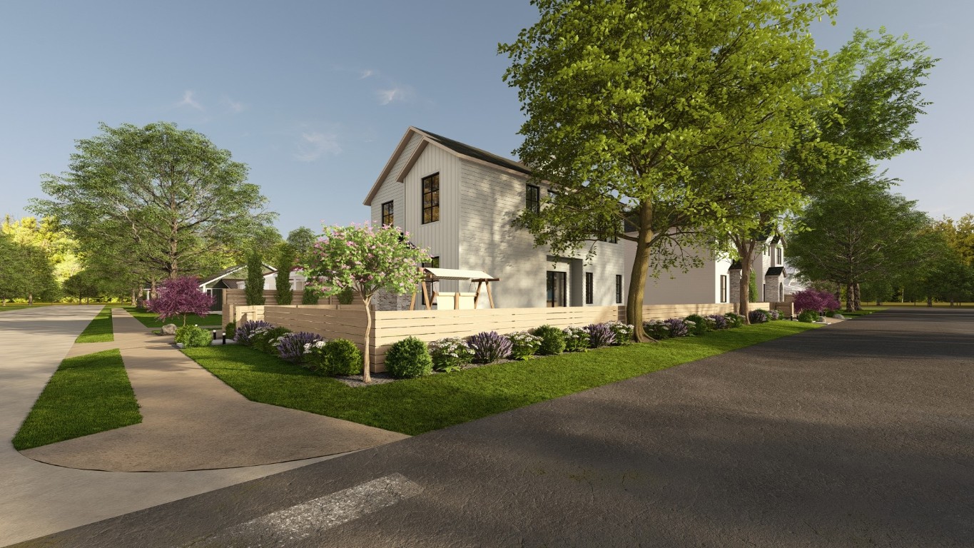 2910 East 4th Street Austin, TX 78702 - Photo 4 of 15 a front view of a house with a yard and trees