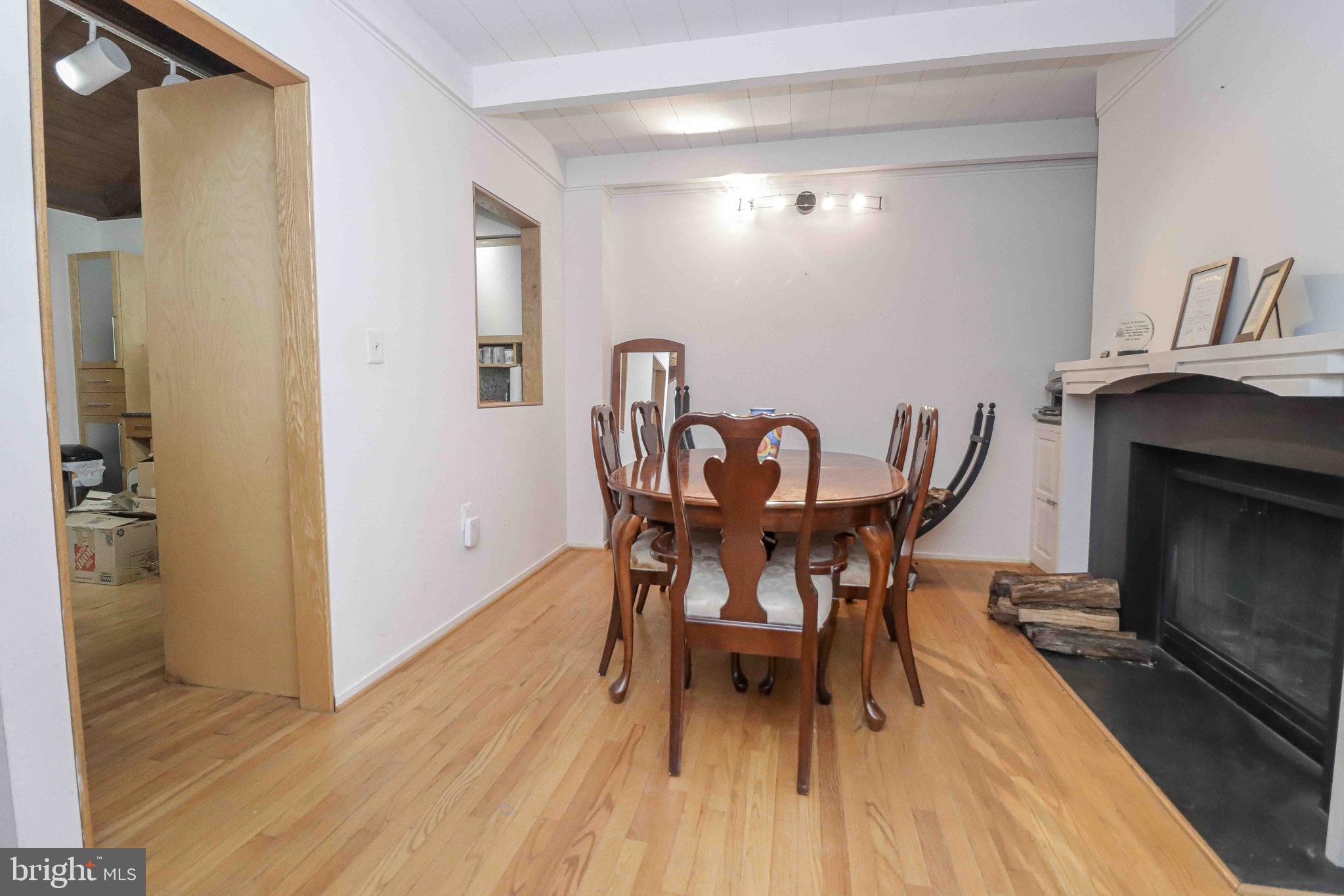 11162 Glade Drive Reston, VA 20191 - Photo 11 of 39 Dining room with fireplace