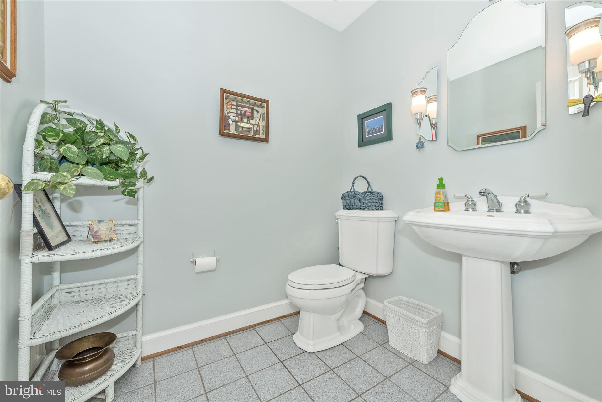 1880 Florence Road Mount Airy, MD 21771 - Photo 15 of 30 a bathroom with a sink toilet and a mirror