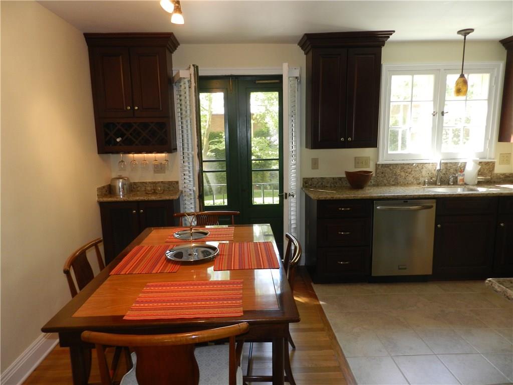 443 Sulgrave Road Pittsburgh, PA 15211 - Photo 3 of 16 The dining room features a custom wine bar and french doors opening onto a private balcony!