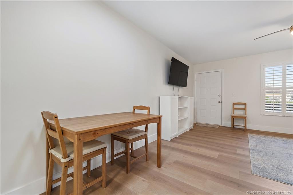 511 Southwest South River Drive, Unit 104 Stuart, FL 34997 - Photo 17 of 61 a view of a livingroom with furniture