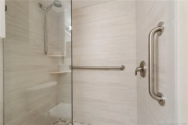 a bedroom with a bed and a view of bedroom