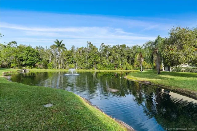 a bedroom with furniture and a table