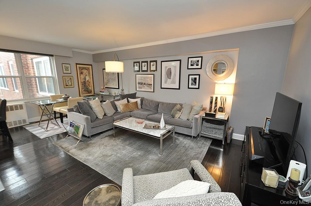 281 Garth Road, Unit A5L Scarsdale, NY 10583 - Photo 2 of 46 a living room with furniture and wooden floor