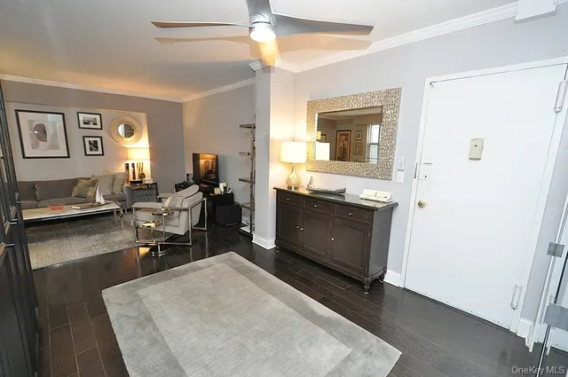 a living room with granite countertop furniture a fireplace and a window