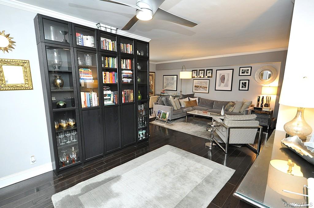 281 Garth Road, Unit A5L Scarsdale, NY 10583 - Photo 32 of 46 a living room with furniture and a flat screen tv