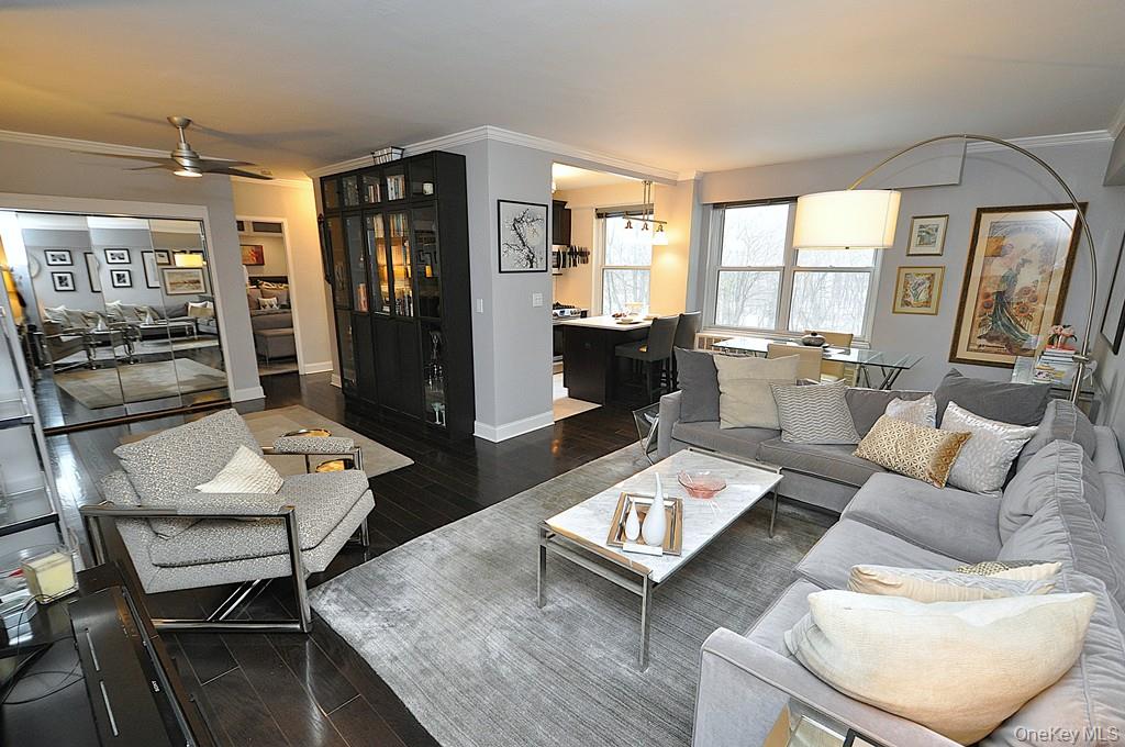 281 Garth Road, Unit A5L Scarsdale, NY 10583 - Photo 6 of 46 a living room with furniture and wooden floor
