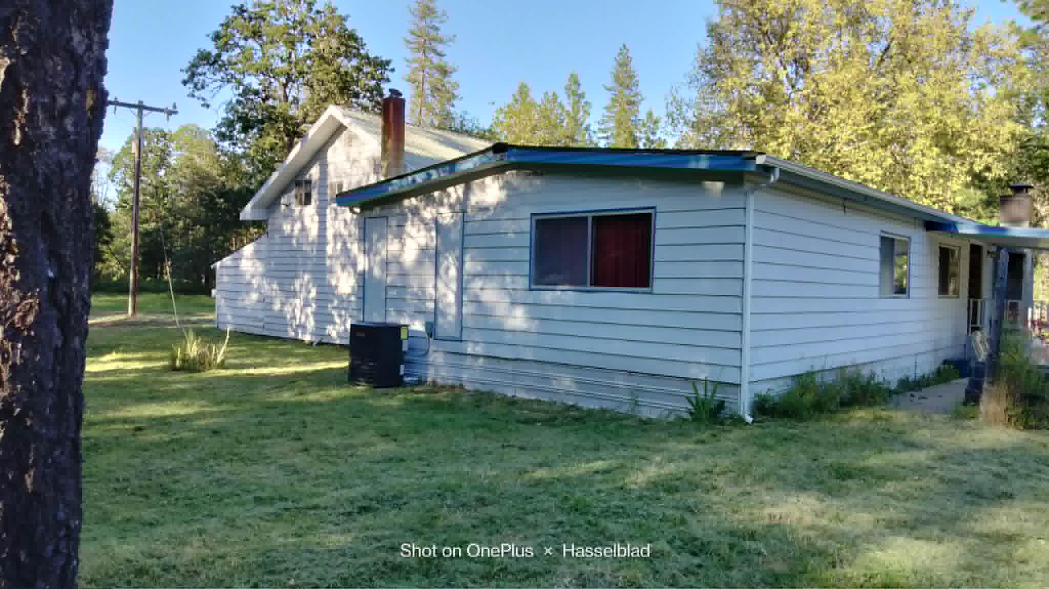 575 Kirkham Road Cave Junction, OR 97523 - Photo 8 of 45 a front view of a house with garden