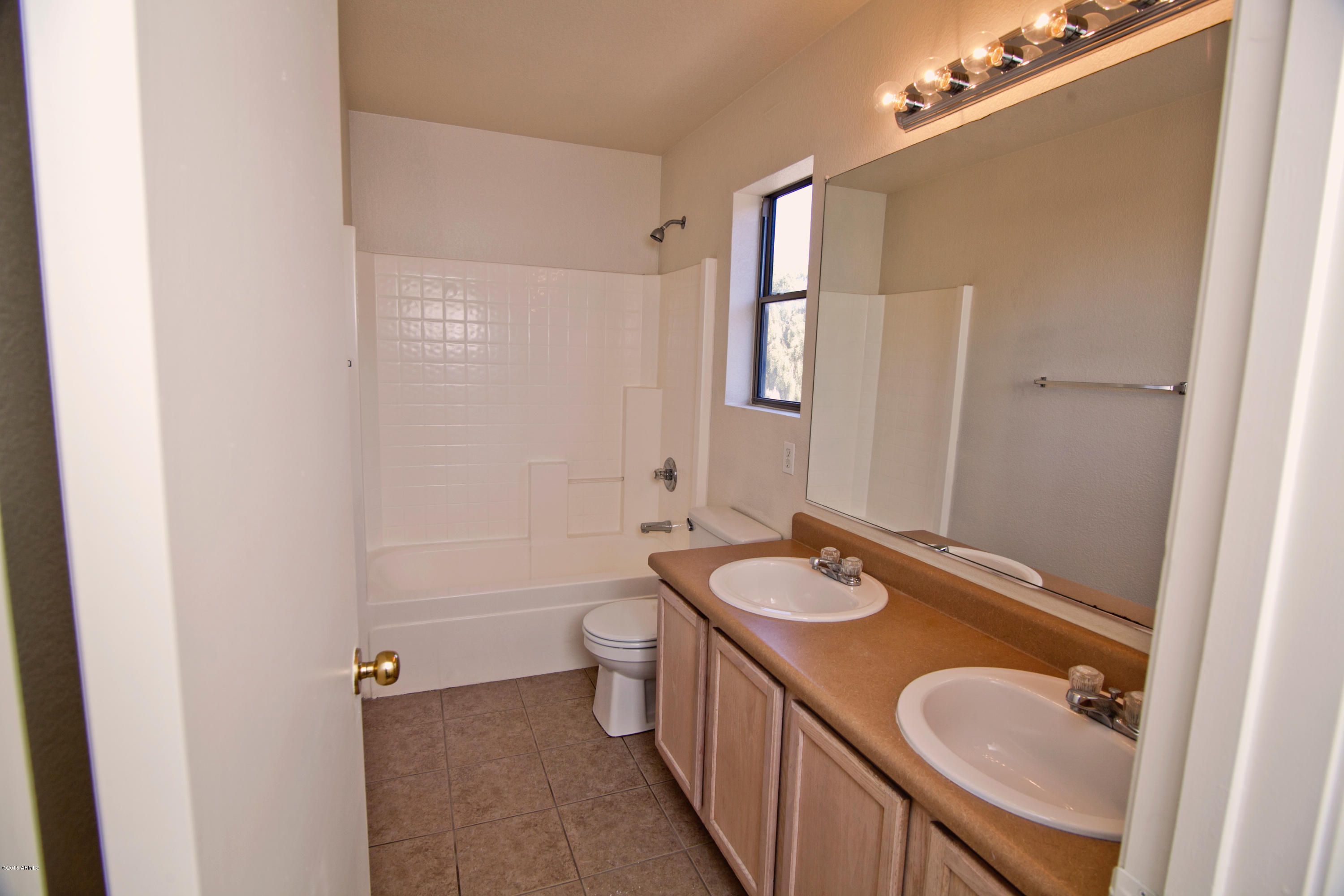 2607 West Bloch Road Phoenix, AZ 85041 - Photo 17 of 20 Upstairs Bath