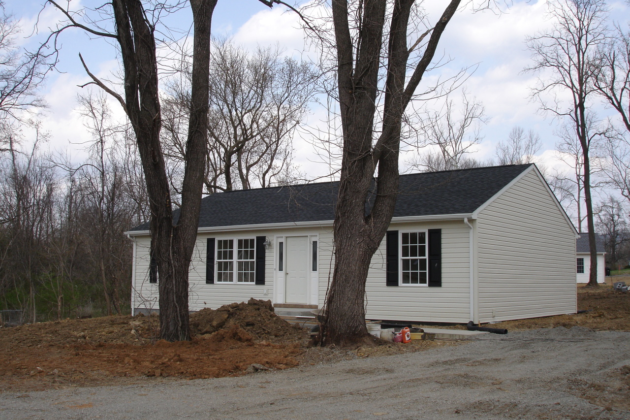 4780 Read Mountain Road Cloverdale, VA 24077 - Photo 1 of 4 a white house that has a tree in front of it