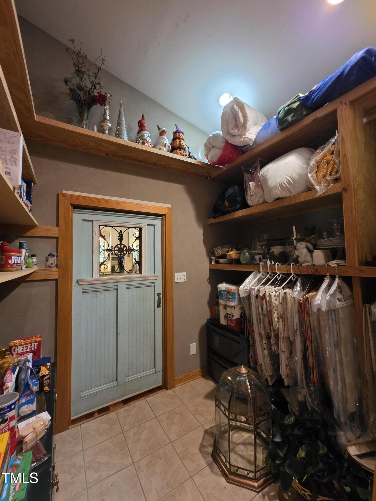 413 Johnson Town Road Zebulon, NC 27597 - Photo 19 of 52 a view of storage and utility room