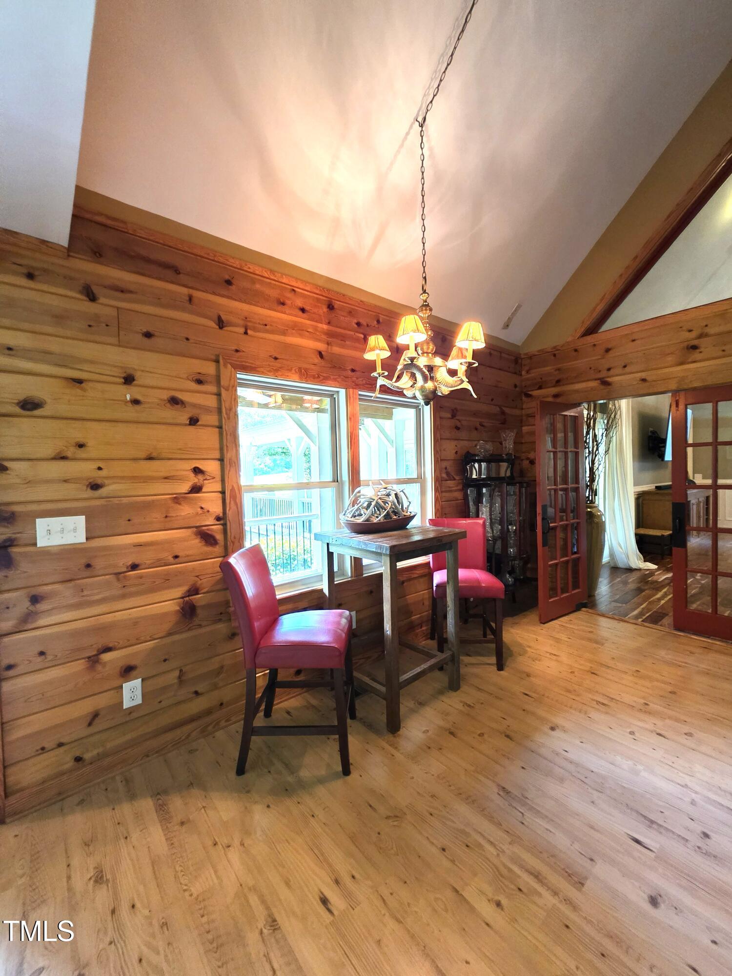 413 Johnson Town Road Zebulon, NC 27597 - Photo 30 of 52 a view of a chairs and table in the patio