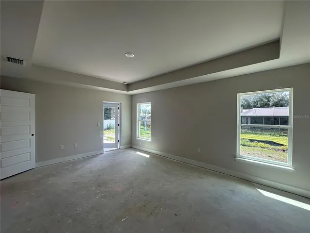 an empty room with windows