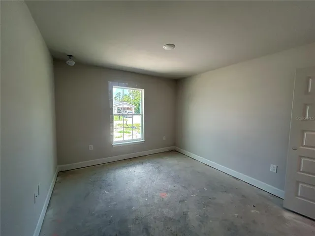 an empty room with a window