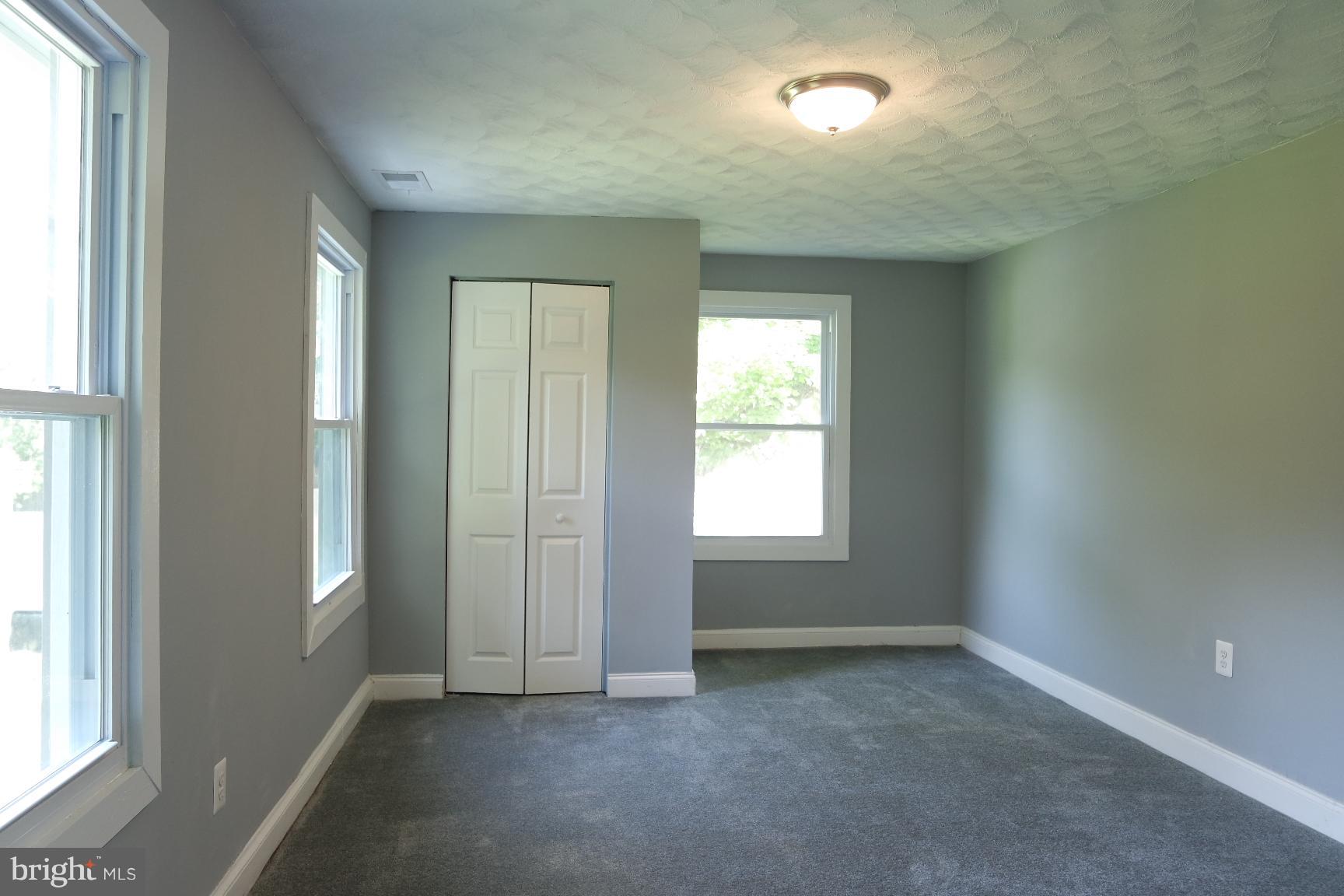 421 Bryan Point Road Accokeek, MD 20607 - Photo 14 of 17 an empty room with windows