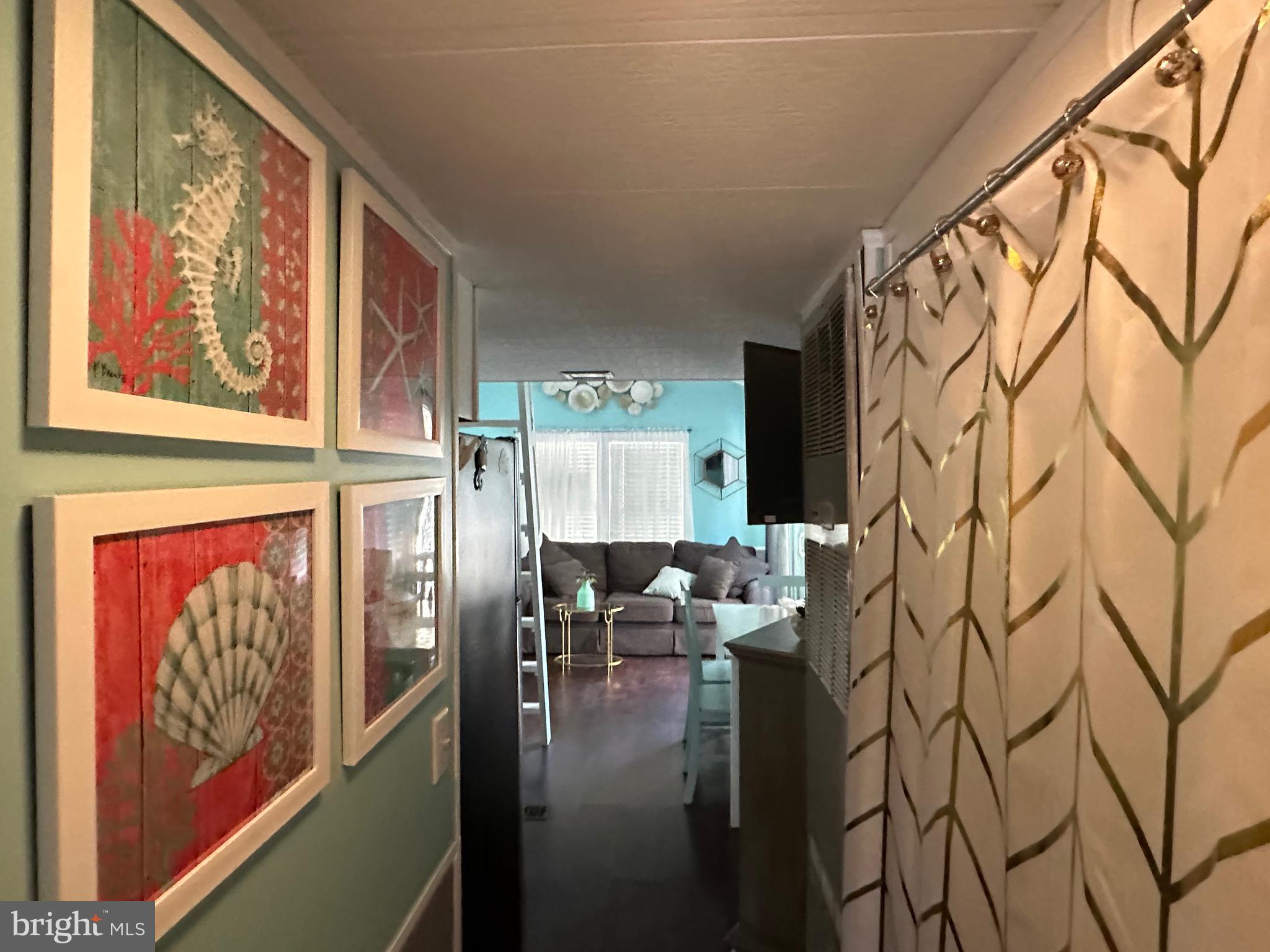 515 Corsons Tavern Road, Unit E52 Ocean View, NJ 08230 - Photo 7 of 15 hallway with storage