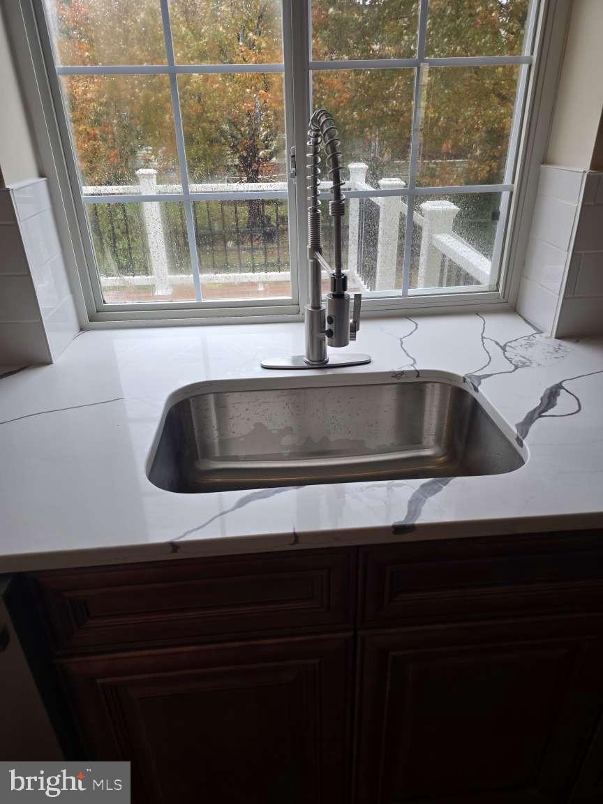 10 Osprey Lane Middletown, DE 19709 - Photo 11 of 25 a kitchen sink with a window