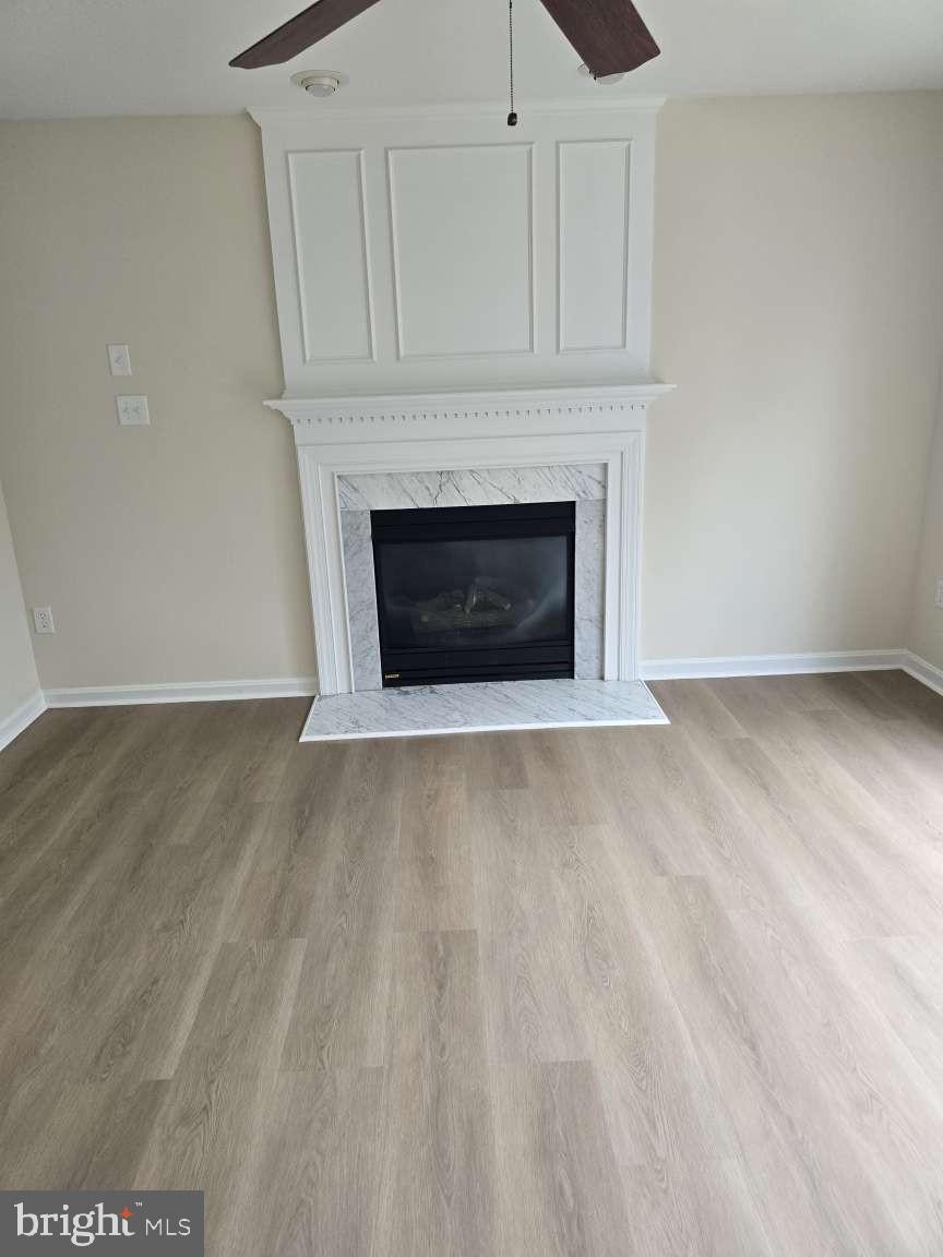 10 Osprey Lane Middletown, DE 19709 - Photo 12 of 25 a view of an empty room with a fireplace