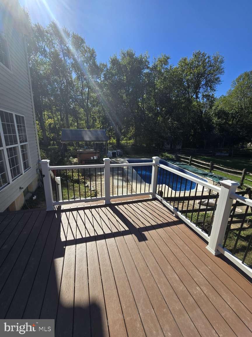 10 Osprey Lane Middletown, DE 19709 - Photo 3 of 25 a view of balcony with wooden floor and outdoor space