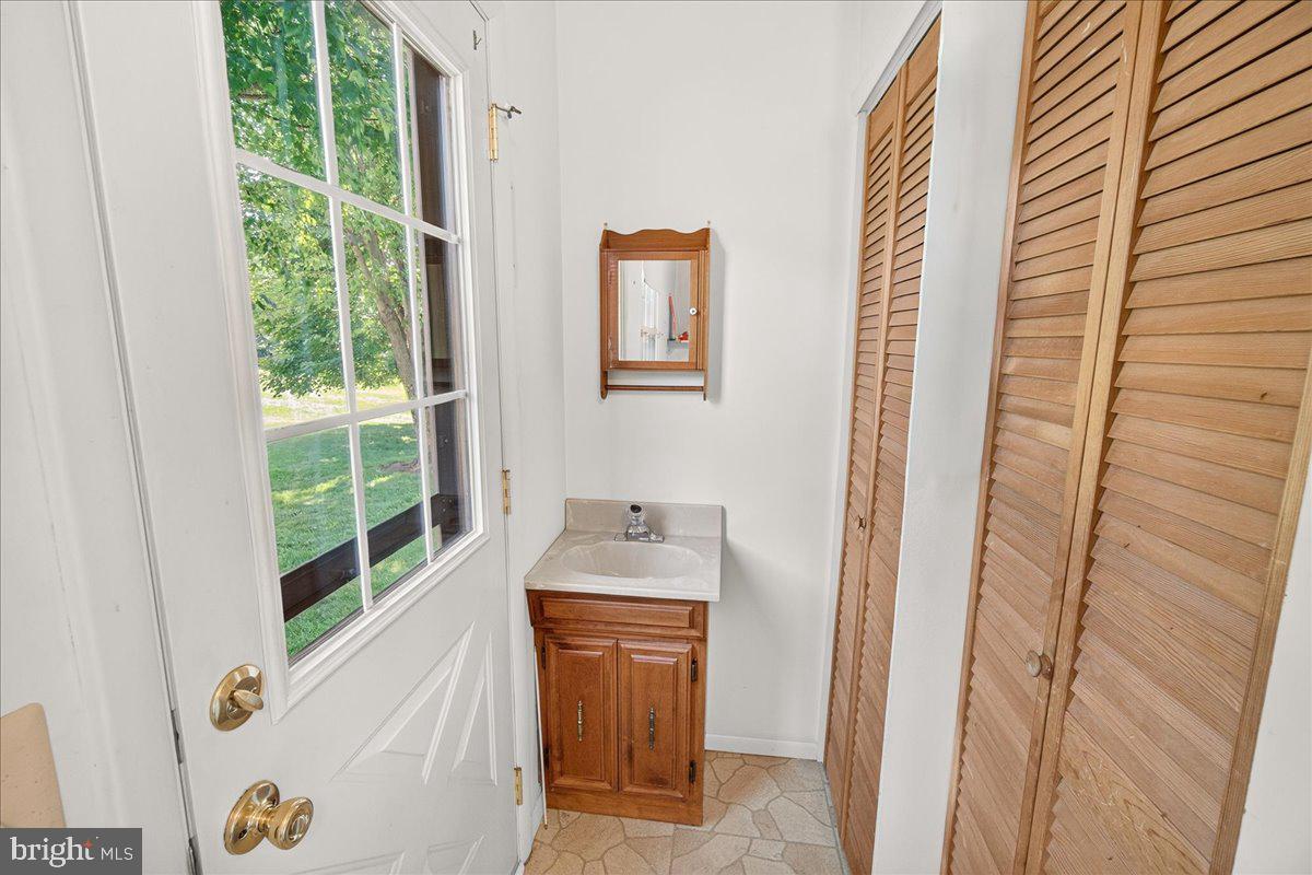 7047 Catalpa Road Frederick, MD 21703 - Photo 23 of 118 Laundry with 1/2 bath