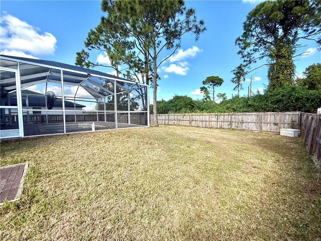 3122 12th Street Southwest Lehigh Acres, FL 33976 - Photo 19 of 19 a view of a backyard