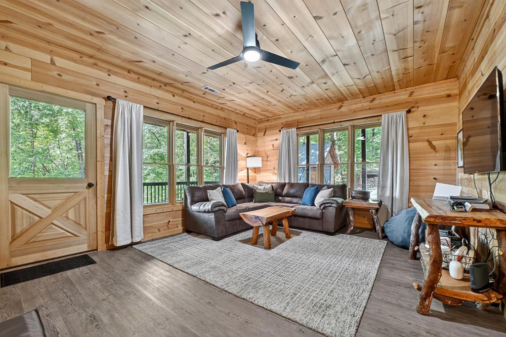 1134 Maggie Chapman Road Blue Ridge, GA 30513 - Photo 53 of 65 a living room with furniture and a large window
