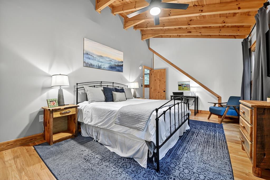 1134 Maggie Chapman Road Blue Ridge, GA 30513 - Photo 10 of 65 a bed room with a bed and a night stand
