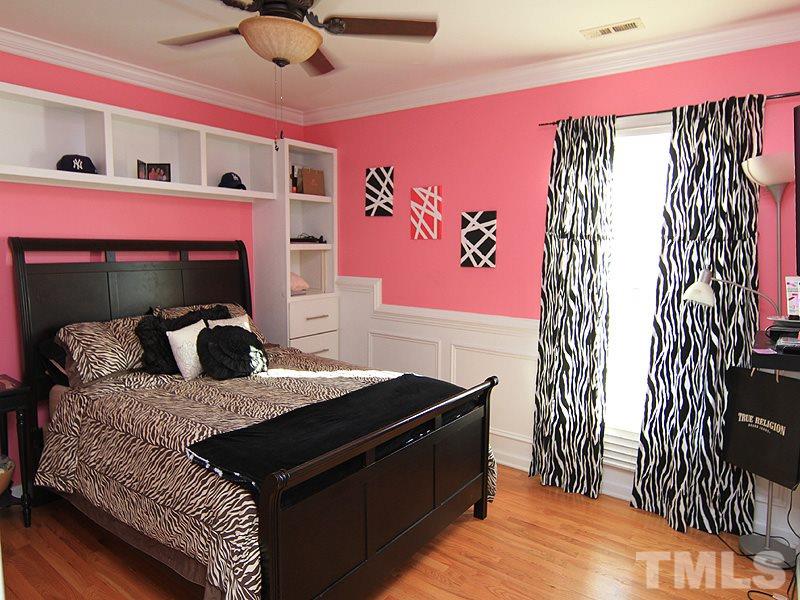 9908 Wyngate Ridge Drive Raleigh, NC 27617 - Photo 12 of 20 Large secondary bedrooms with custom shelving, beautiful millwork, more hardwoods and don't miss the closet -- more custom drawers and shelving! Your child/teen will love this space!