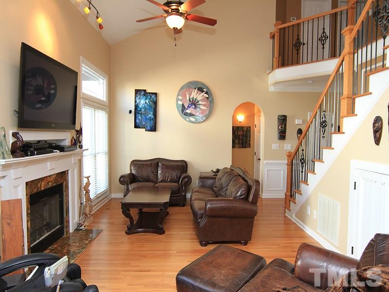 9908 Wyngate Ridge Drive Raleigh, NC 27617 - Photo 5 of 20 All new windows throughout the home and no carpet! Nice transom windows in this large family space. Every fixture and fan has been updated.