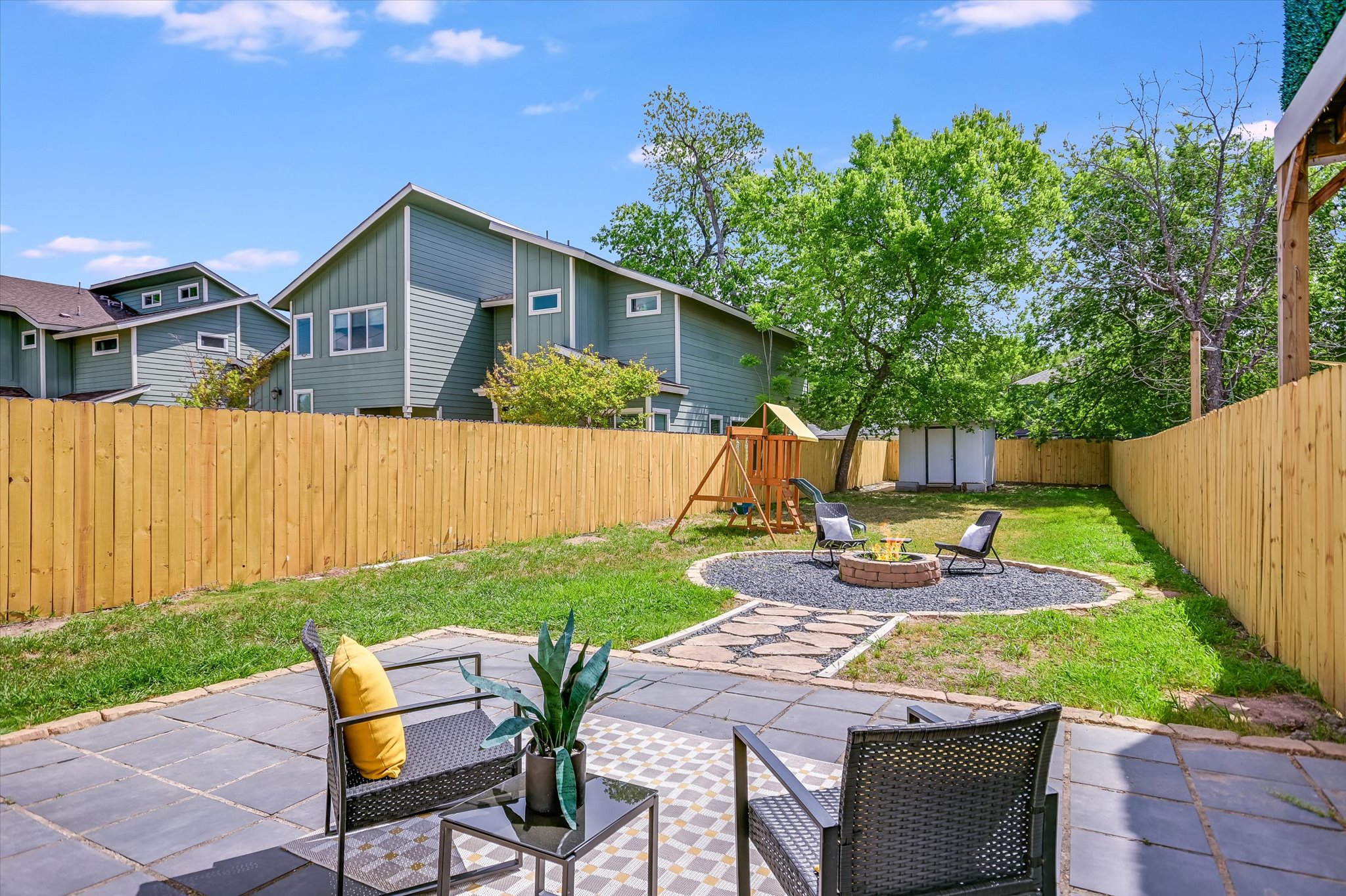 1121 Walton Lane, Unit B Austin, TX 78721 - Photo 16 of 18 a view of backyard of house with seating space