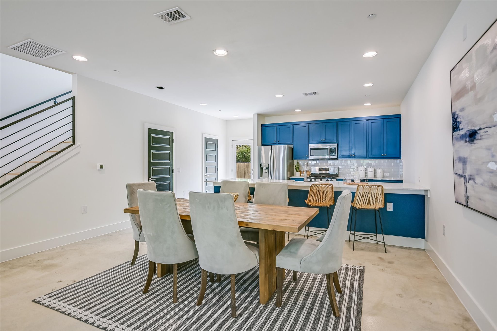 1121 Walton Lane, Unit B Austin, TX 78721 - Photo 5 of 18 a view of a dining room with furniture