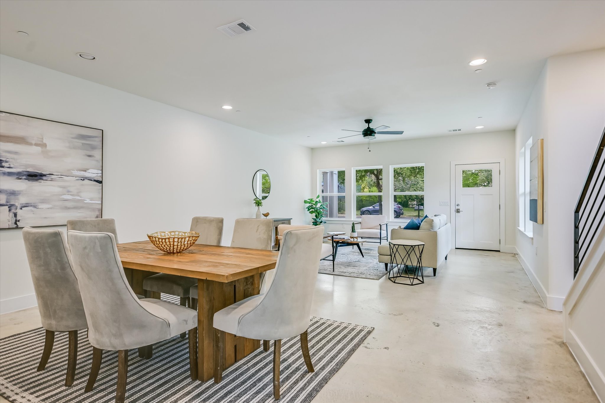 1121 Walton Lane, Unit B Austin, TX 78721 - Photo 6 of 18 a view of a dining room with furniture window and outside view
