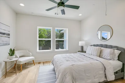 a bedroom with a bed and window
