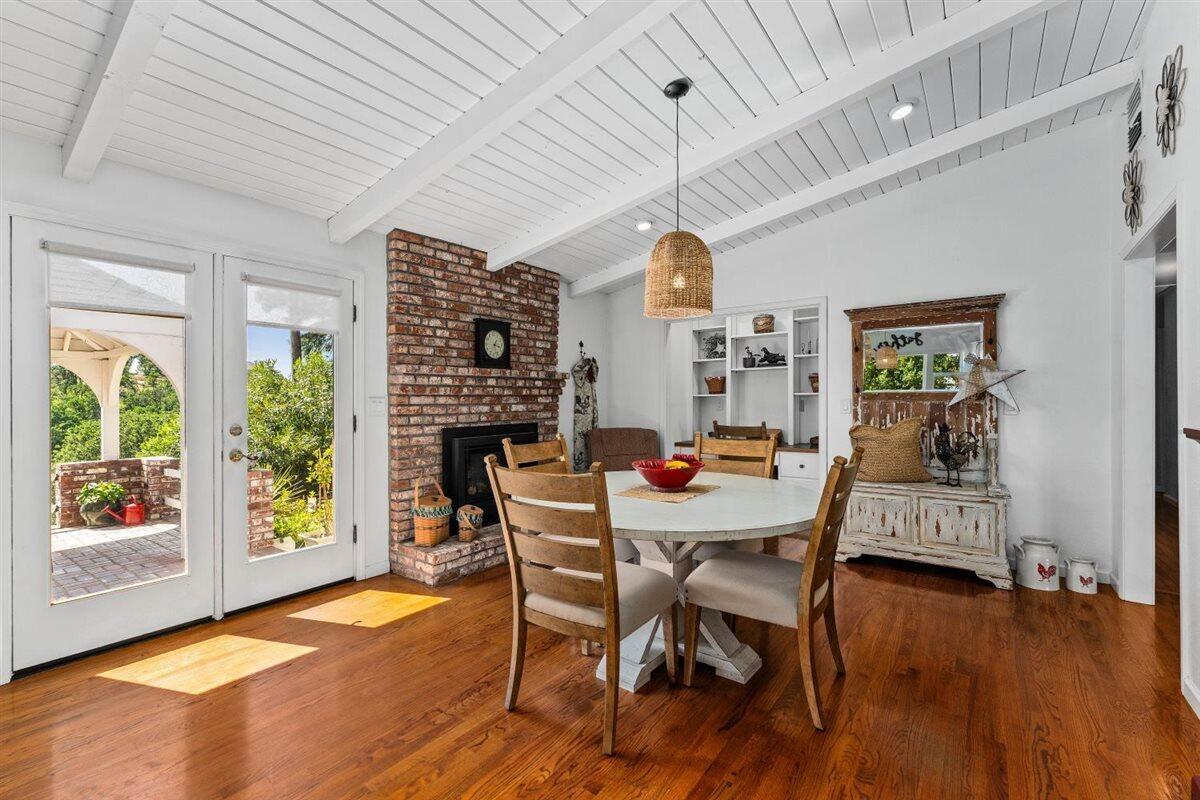 14545 Carriage Lane Red Bluff, CA 96080 - Photo 12 of 67 a view of a dining room with furniture window and wooden floor