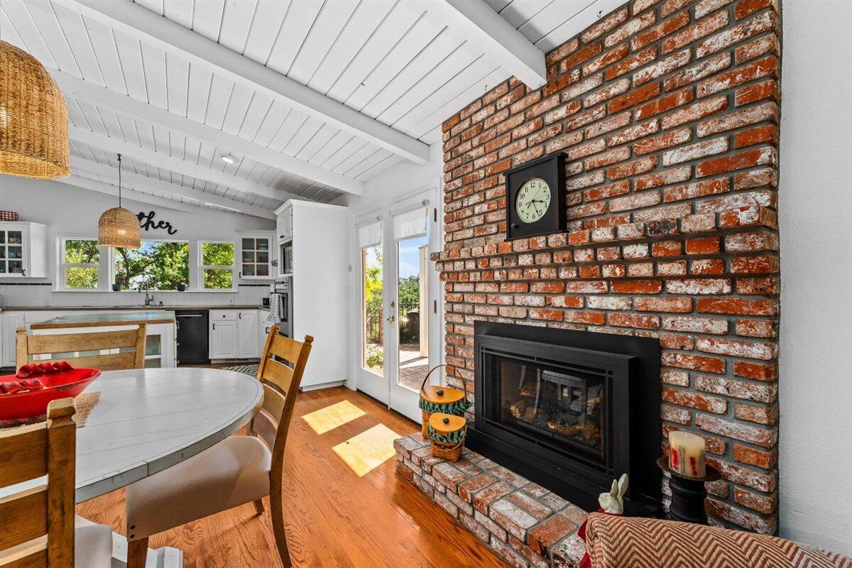 14545 Carriage Lane Red Bluff, CA 96080 - Photo 13 of 67 a living room with furniture a fireplace and a table