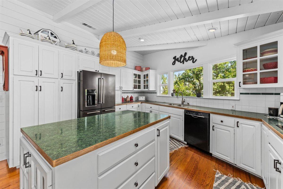 14545 Carriage Lane Red Bluff, CA 96080 - Photo 20 of 67 a kitchen with stainless steel appliances granite countertop a sink a stove and refrigerator
