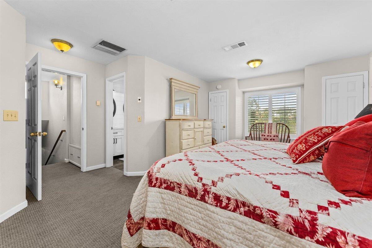 14545 Carriage Lane Red Bluff, CA 96080 - Photo 22 of 67 a bedroom with a bed and a window