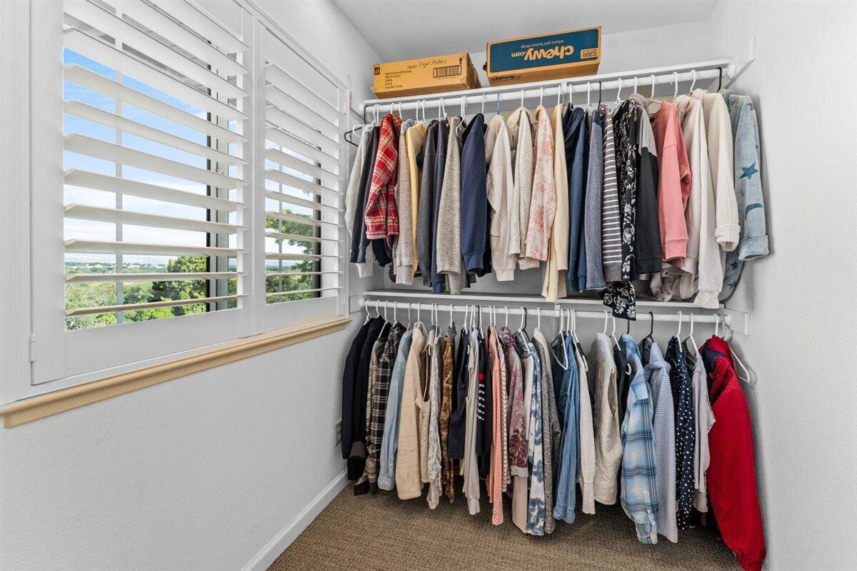 14545 Carriage Lane Red Bluff, CA 96080 - Photo 24 of 67 a view of walk in closet with clothes