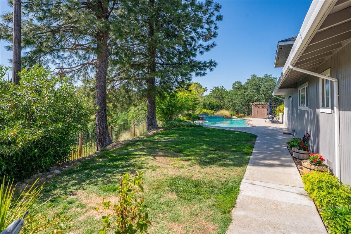 14545 Carriage Lane Red Bluff, CA 96080 - Photo 42 of 67 a view of a pathway with a yard