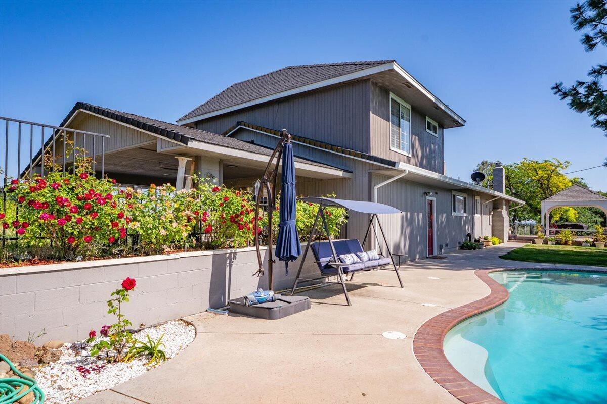 14545 Carriage Lane Red Bluff, CA 96080 - Photo 45 of 67 a front view of a house with garden
