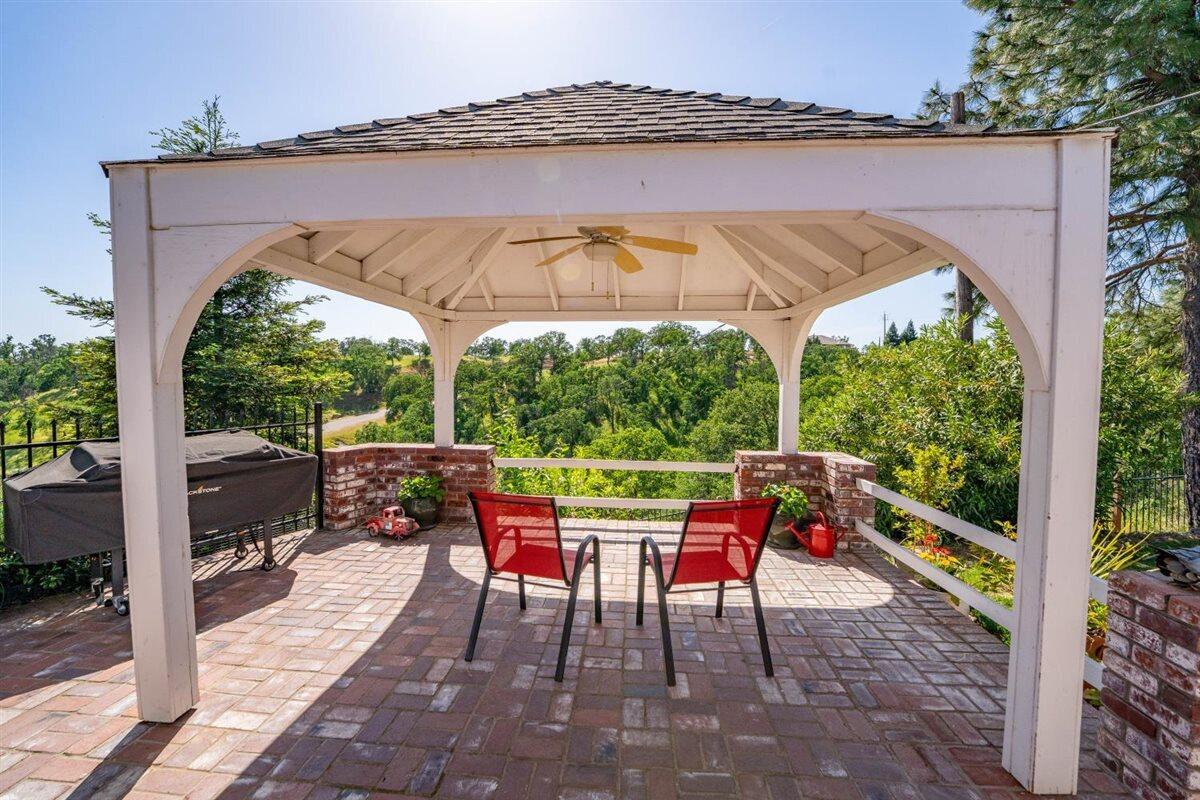 14545 Carriage Lane Red Bluff, CA 96080 - Photo 51 of 67 a view of an outdoor sitting area with furniture and backyard