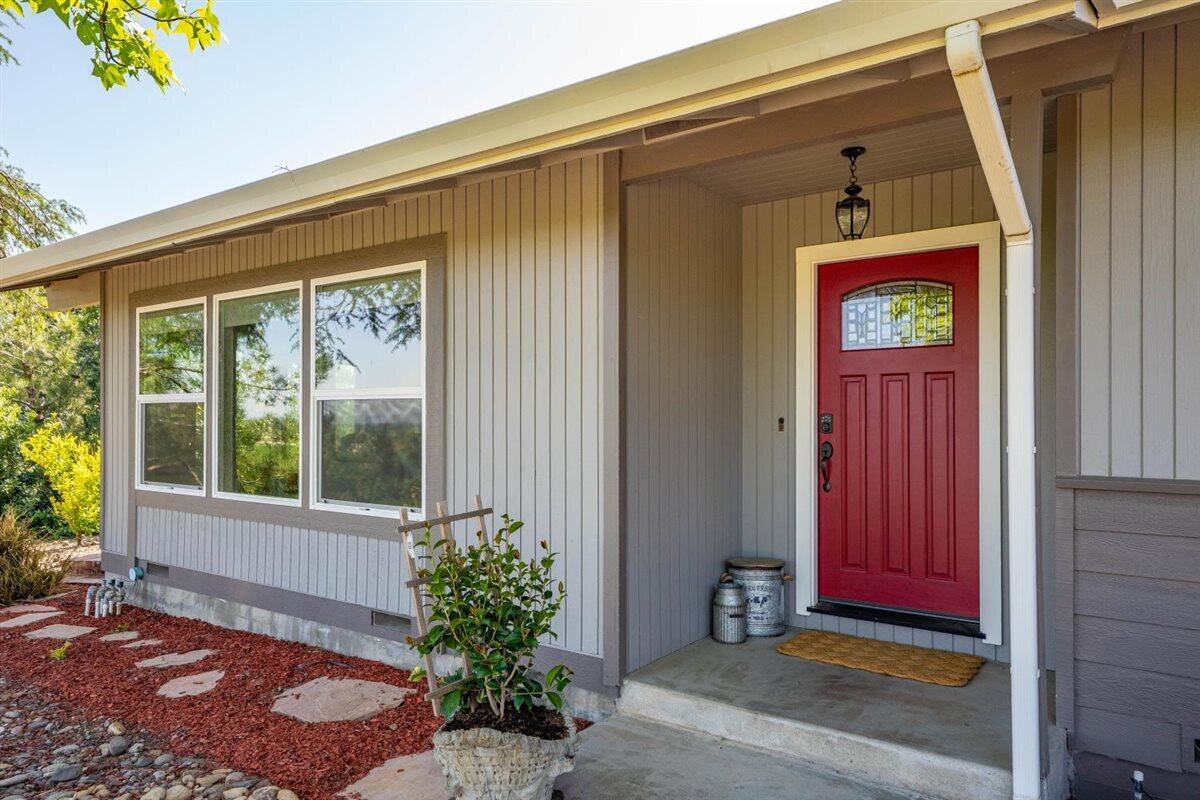 14545 Carriage Lane Red Bluff, CA 96080 - Photo 52 of 67 a front view of a house with a yard