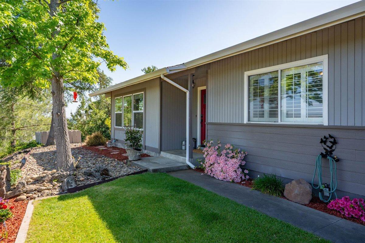 14545 Carriage Lane Red Bluff, CA 96080 - Photo 53 of 67 a front view of a house with garden