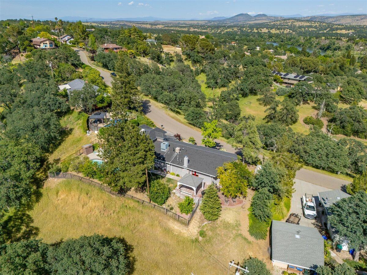 14545 Carriage Lane Red Bluff, CA 96080 - Photo 63 of 67 an aerial view of residential houses with outdoor space