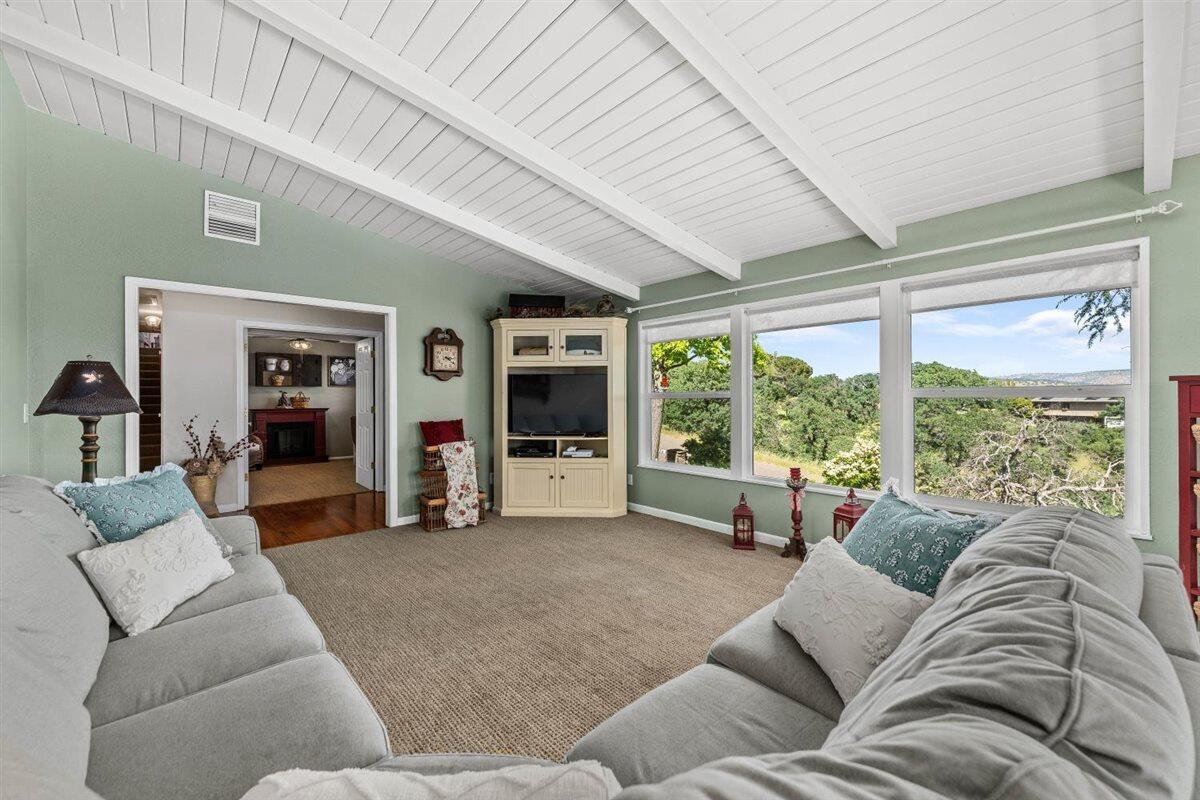 14545 Carriage Lane Red Bluff, CA 96080 - Photo 9 of 67 a living room with furniture and large windows