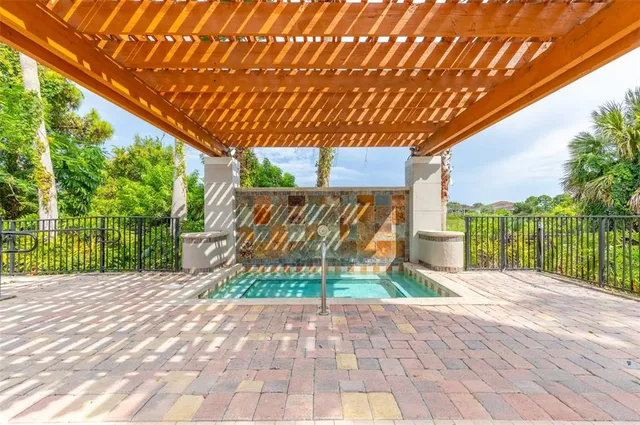 a view of a backyard with a patio