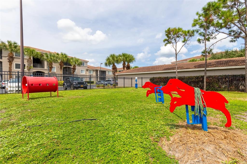 1010 Northwest Fresco Way, Unit 1B01206 Stuart, FL 34994 - Photo 33 of 47 a view of outdoor space yard and patio